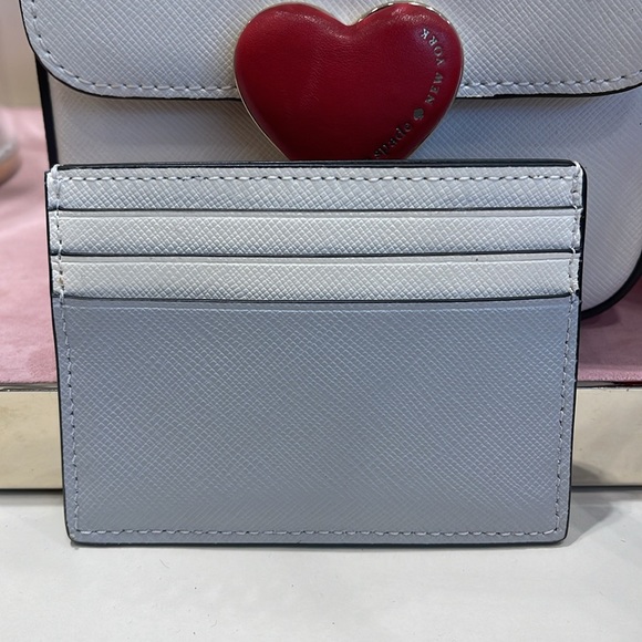 Kate Spade Madison Small Slim Card Holder
Platinum Grey Multi
NWT - Picture 15 of 16